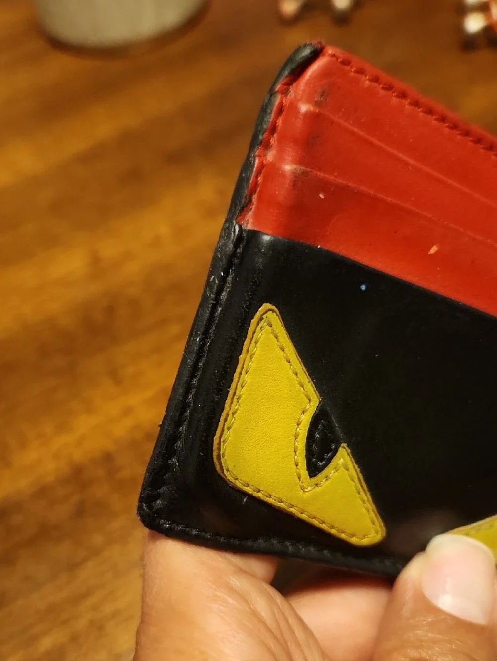 Fendi Black Card Holder with Red Slots and Yellow Eye Appliqués